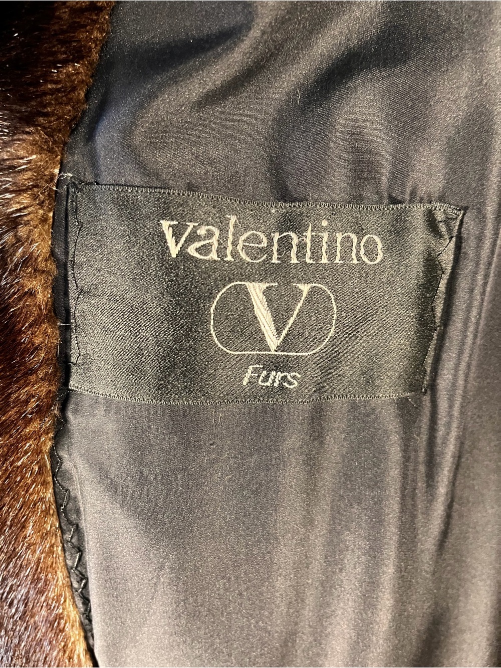 Fur coat - likely Pea Coat or Trench?
